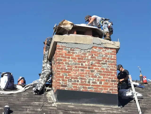 Claremont Chimney Sweep installing a custom chimney crown in Claremont, CA